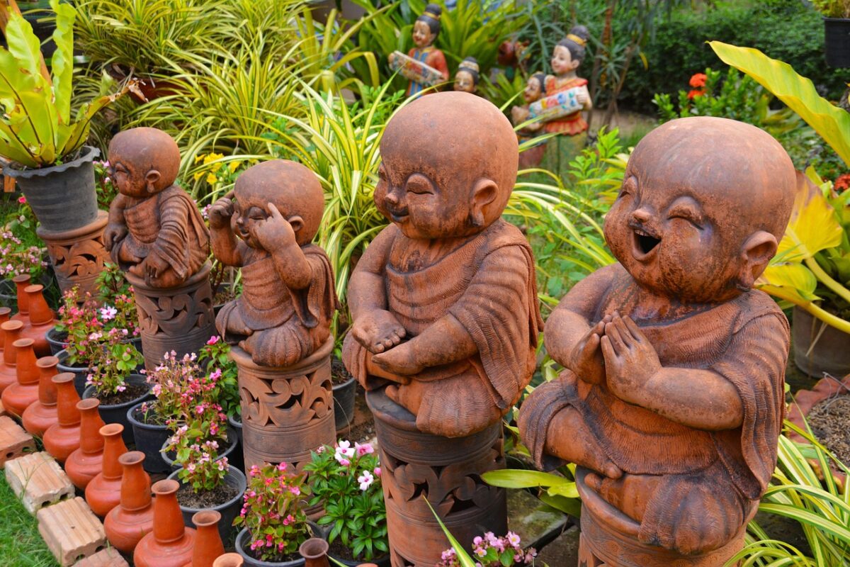 A traditional red-hatted garden gnome figure