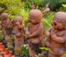 A traditional red-hatted garden gnome figure